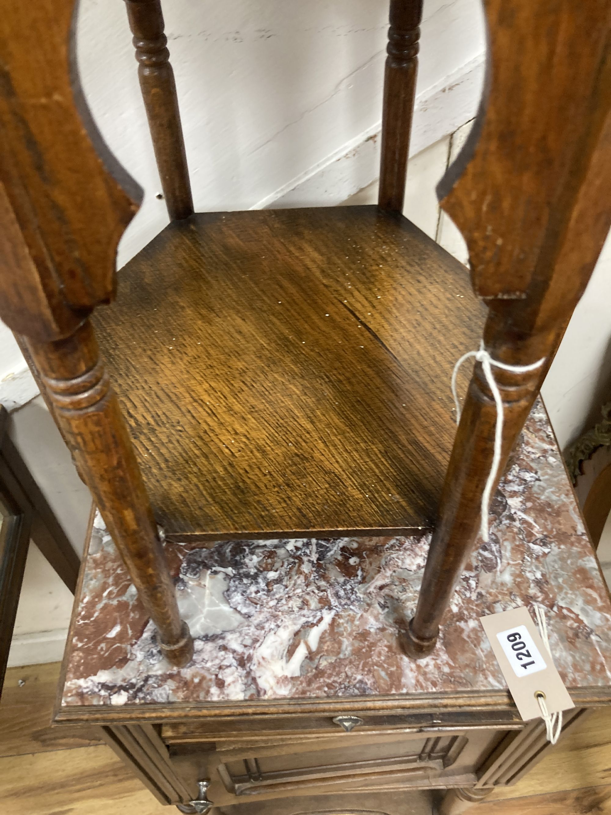 An early 20th century Moorish style hexagonal oak occasional table, width 36cm, height 51cm